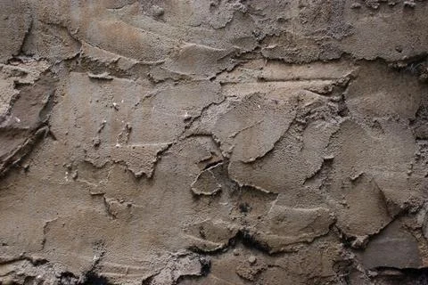 Texture on the walls of an old building made of cement Stock Photos