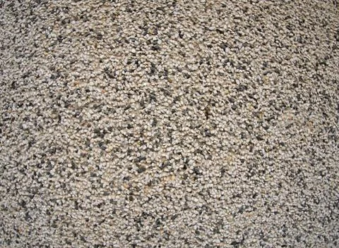 The texture of the walls of small pebbles Stock Photos