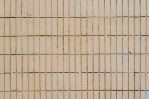 The texture of the walls of smooth brick or smooth tile white and yellow Stock Photos