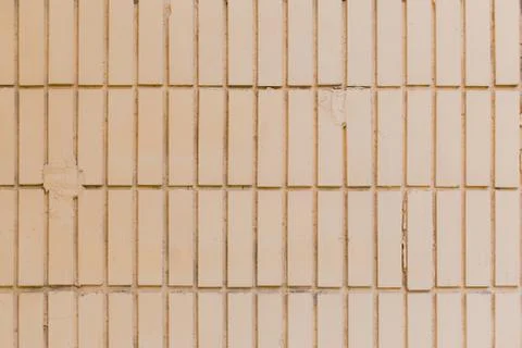 The texture of the walls of smooth brick or smooth tile white and yellow Stock Photos