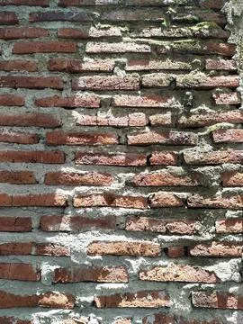 The texture of the walls where the bricks are still visible. Фото