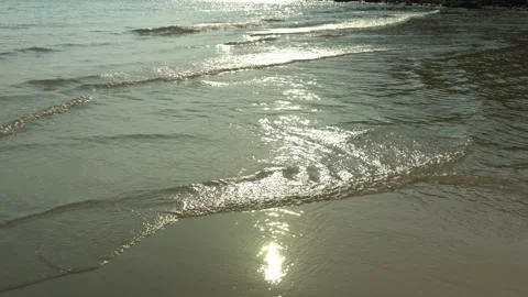 Texture Of Water And Sand. Bright Golden Sand. Waves Break On The Sandy Shore Video stock 112590163