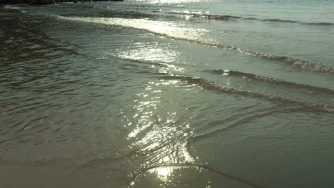 Texture Of Water And Sand. Bright Golden Sand. Waves Break On The Sandy Shore Video stock 112590357
