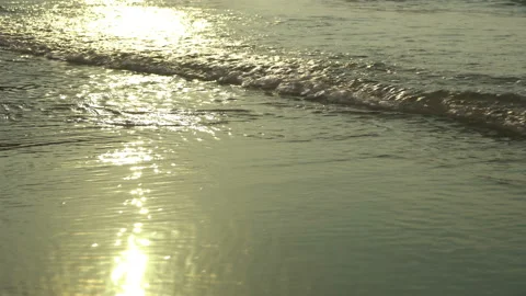 Texture Of Water And Sand. Bright Golden Sand. Waves Break On The Sandy Shore Video stock 112590724
