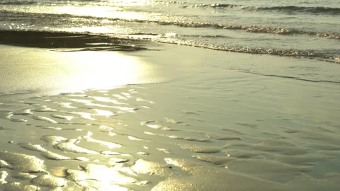 Texture Of Water And Sand. Bright Golden Sand. Waves Break On The Sandy Shore Video stock 112590835