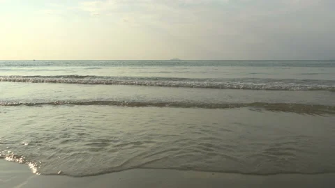 Texture Of Water And Sand. Bright Golden Sand. Waves Break On The Sandy Shore Video stock 112591193