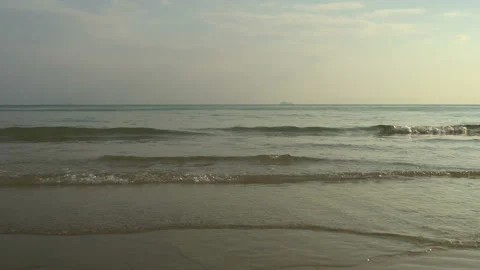 Texture Of Water And Sand. Bright Golden Sand. Waves Break On The Sandy Shore Video stock 112591333
