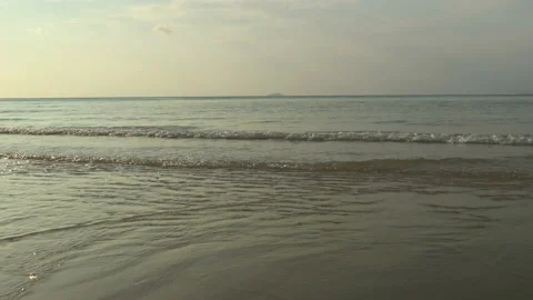 Texture Of Water And Sand. Bright Golden Sand. Waves Break On The Sandy Shore Video stock 112591599