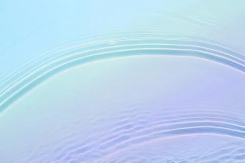 The texture of water on a blue background. Stock Photos