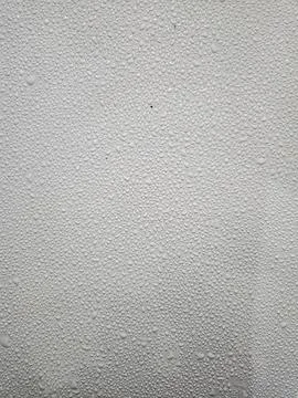 Texture of water droplets on a white surface Stock Photos