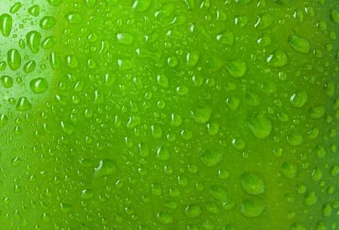 Texture water drops on the apple, background Stock Photos