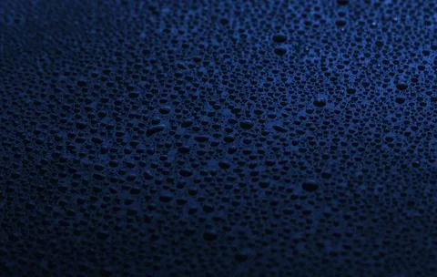 Texture of water drops on black background Stock Photos