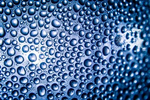 Texture of water drops on bottle Stock Photos