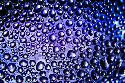 Texture of water drops on bottle Stock Photos