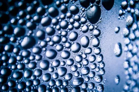 Texture of water drops on bottle Stock Photos