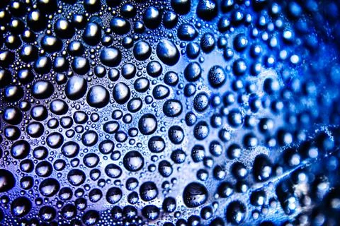 Texture of water drops on bottle Stock Photos