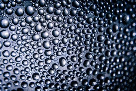 Texture of water drops on bottle Stock Photos