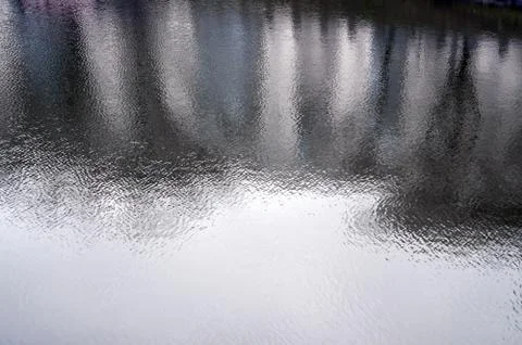 The texture of the water in the river under the influence of wind. A lot of s Stock Photos