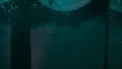 Texture of the water is a rumbling chaos with bubbles created Stock Footage 310669185