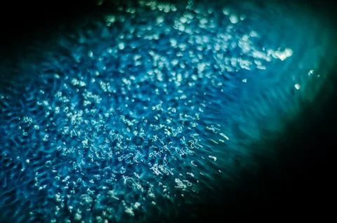 The texture of water under the influence of vibration in 528 hertz Stock Photos