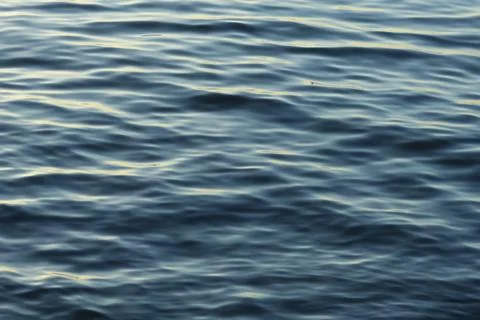Texture of water waves movement, background Stock Photos