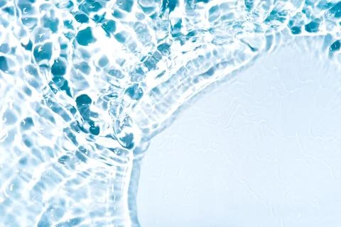 The texture of water on a white background. Stock Photos