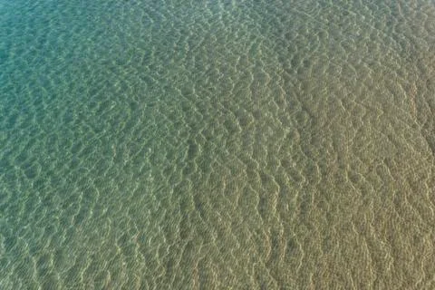 Texture of the waves of the calm sea Stockfoto's