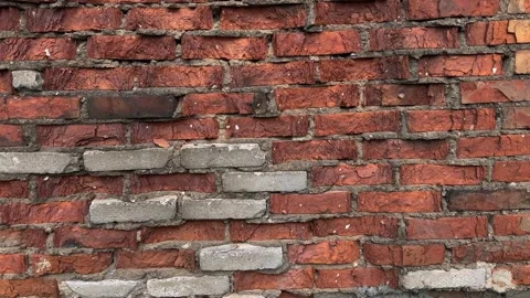 Texture of weathered red brick wall with cracked mortar Video stock 337302565