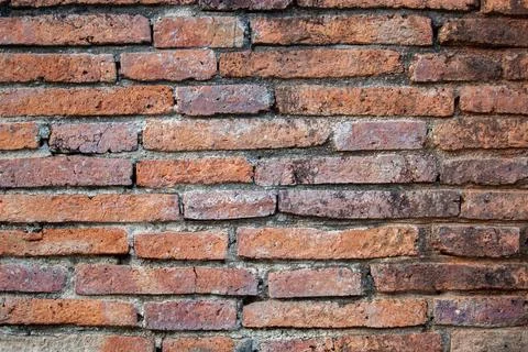 Texture weathered stain old brick wall Stock Photos
