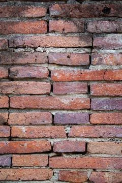 Texture weathered stain old brick wall Stock Photos