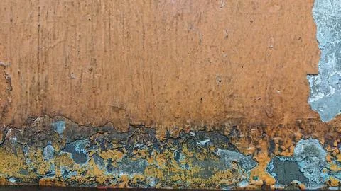 Texture of weathered torn orange wall with soft shadow Stock Photos
