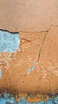 Texture of weathered torn orange wall with soft shadow Stock Photos