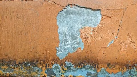 Texture of weathered torn orange wall with soft shadow Stock Photos
