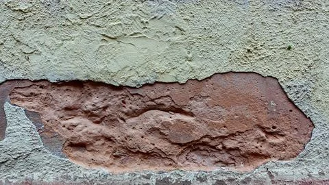 Texture of Weathered Wall With Peeling Paint in Urban Setting Foto stock