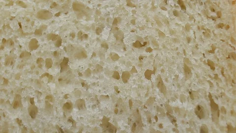 Texture of white bread rotating extreme close up, macro shot Stock Footage 83477095