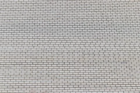 Texture of a white brick wall for background 스톡 사진
