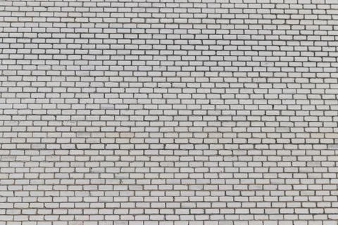 Texture of a white brick wall for background 스톡 사진