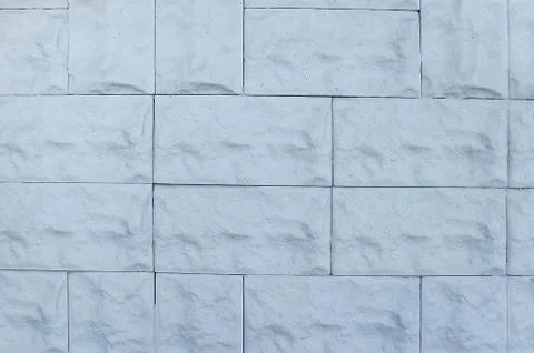 Texture of a white brick wall. Close-up. Stock Photos