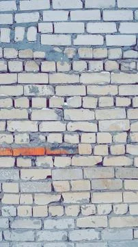 Texture of a White Brick Wall. Large gaps between the bricks. The curve of th Stock Photos