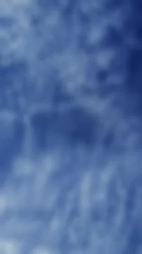 Texture white clouds and blue sky in sunny day, focus beautiful blur Stock Photos