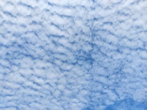 Texture of white clouds in the blue sky Stock Photos