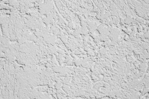 Texture of a white decorative plaster or concrete wall. Stock Photos