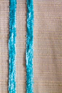 Texture of white fabric made of polyester with two blue stripes Stock Photos