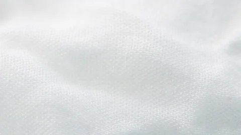 Texture of white fabric shows a soft, comfortable feel. Abstract background. Stock Footage 136494581