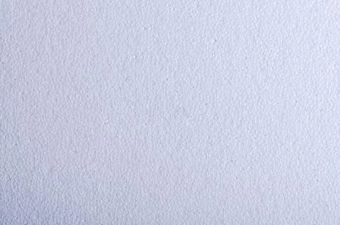 Texture of white foam plastic, close-up. Stock Photos