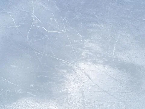 Texture of white  ice surface with skate scratches Stock Photos