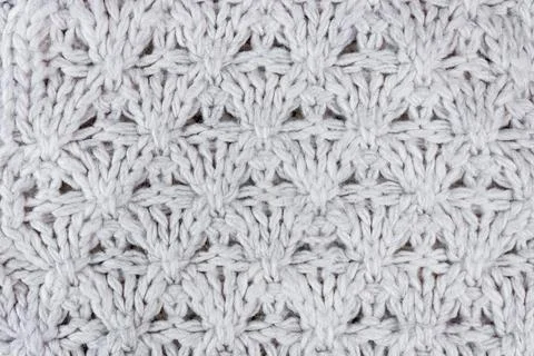 Texture of white knitted sweater Stock Photos