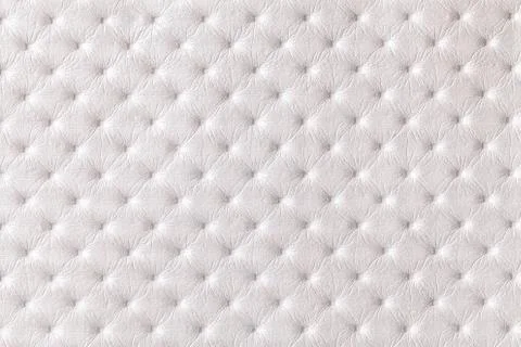 Texture of white leather background with capitone pattern, macro. Stock Photos