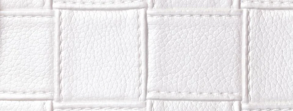 Texture of white leather background with square pattern and stitch, macro. Foto stock