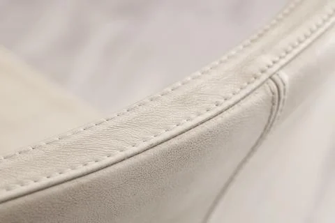 Texture of white leather chair in workshop, closeup Stock Photos